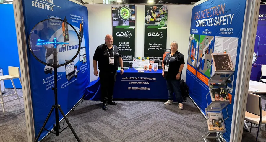 Gas Detection Australia at Land Forces 2026 – booth Two Gas Detection Australia team members standing at the Industrial Scientific stand at Land Forces 2026